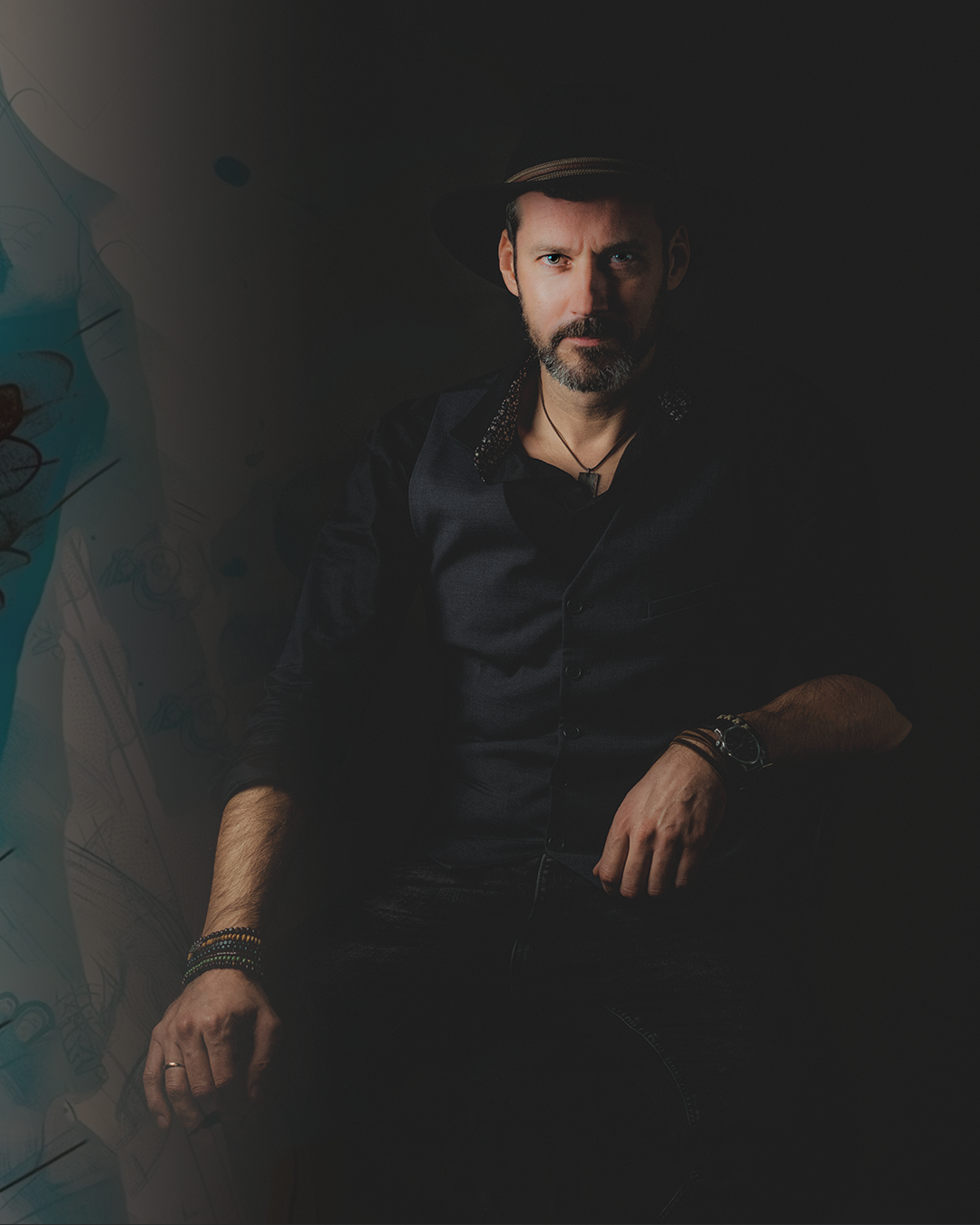 Bartek Grzanek, wokalista, gitarzysta. Portret na ciemnym tle